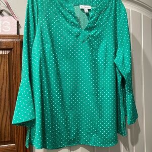 Worn once-too big for me. Wash and hang to dry. No ironing.